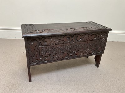 Lot 2017 - An 18th century style carved oak six plank...