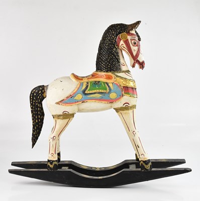 Lot 2102 - A modern painted Tibetan style rocking horse...