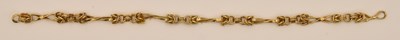 Lot 1523 - A 9ct yellow gold bracelet with fancy links...