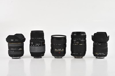 Lot 104 - Five Nikon fit lenses, comprising a Sigma 10mm-...