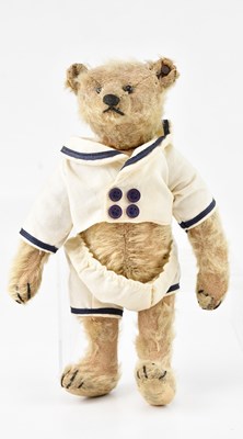 Lot 2047 - STEIFF; an early small teddy bare, circa 1920s,...