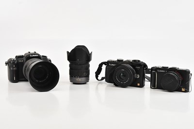 Lot 101 - PANASONIC; a Lumix G2 DSLR camera, with two...
