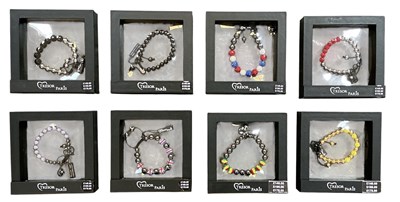 Lot 1560A - TRESOR PARIS; eight boxed and sealed costume...