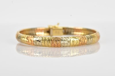 Lot 105 - An Italian tricolour metal bracelet with...
