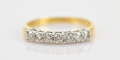 Lot 415 - An 18ct yellow and white gold diamond set...