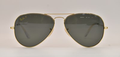 Lot 1219 - RAY-BANS; a cased pair of limited edition 18ct...