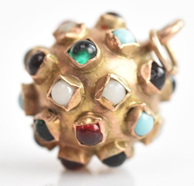 Lot 319 - A 9ct gold yellow gold ball pendant, set with...