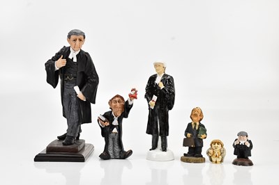 Lot 1483 - A collection of resin lawyer figures, mainly...