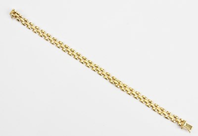 Lot 57 - A 9ct yellow gold panther type bracelet,...