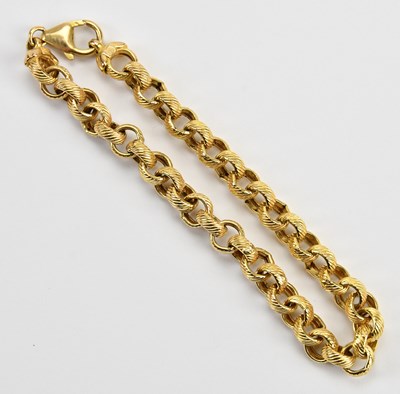 Lot 49 - A 9ct yellow gold textured articulated hoop...