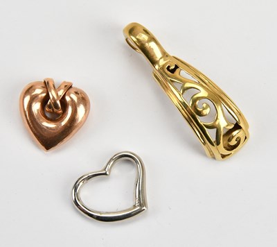 Lot 317 - A 14ct white gold heart shaped pendant, a...