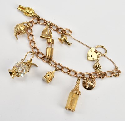 Lot 99 - A 9ct flat link bracelet with ten 9ct and...
