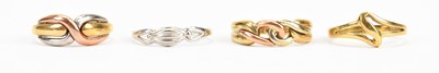 Lot 471 - Two 9ct trigold love knot rings, sizes N, a...