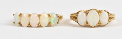 Lot 475 - A 9ct yellow gold opal set five stone dress...