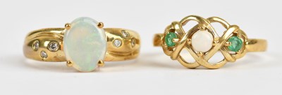 Lot 545 - A 9ct yellow gold opal and diamond set dress...