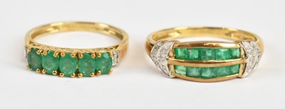 Lot 490 - A 9ct yellow gold diamond and emerald five...