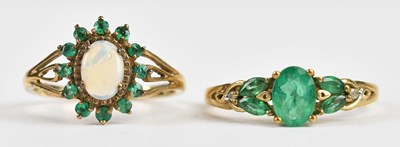 Lot 484 - A 9ct yellow gold emerald and diamond five...