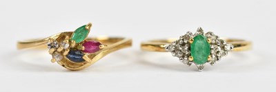 Lot 530 - Two 9ct yellow gold dress rings set with clear,...