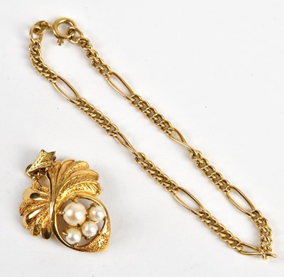 Lot 313 - A 9ct gold pearl set pendant, set with four...