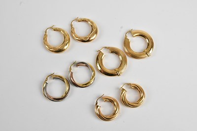 Lot 174 - Four pairs of 9ct gold hoop earrings, combined...