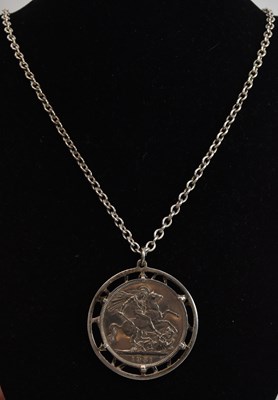 Lot 1551 - A George VI 1951 crown, George and Dragon, in...