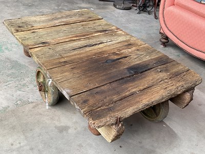 Lot 666 - An early plank trolley, with wheels marked H.C....