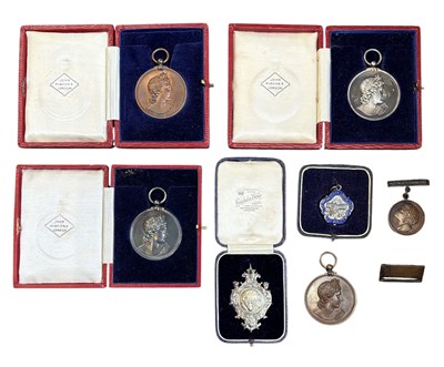 Lot 1219A - Seven music related prize medallions and fobs...