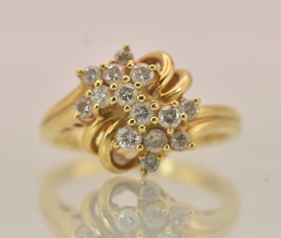 Lot 1260 - An 18ct yellow gold contemporary style diamond...