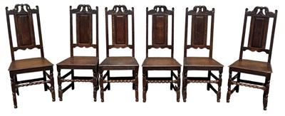 Lot 12 - A set of six 18th century oak dining chairs,...