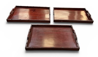 Lot 1029 - A graduated set of three Chinese carved...