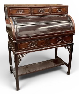 Lot 41 - An early 20th century Chinese carved hardwood...