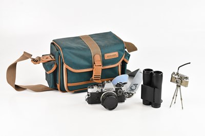 Lot 132 - OLYMPUS; an OM10 camera, a pair of Source...