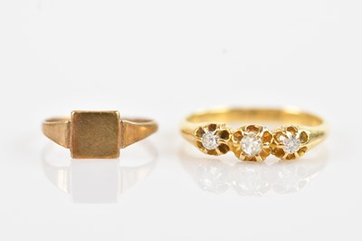 Lot 246 - An 18ct yellow gold diamond set three stone...