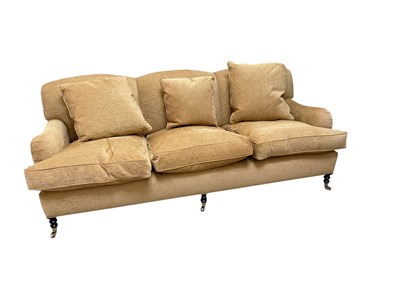 Lot 1021 - GEORGE SMITH; a modern three seater sofa, with...