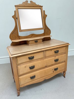 Lot 74 - A Victorian pine dressing chest with two short...