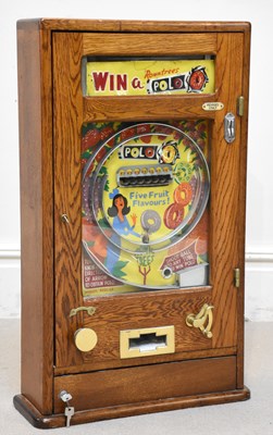 Lot 17 - An early 20th century oak cased pin ball...