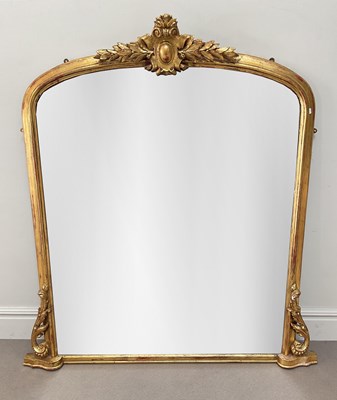 Lot 2079 - A Victorian gilt overmantel framed arch topped...