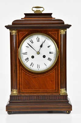 Lot 2300 - An Edwardian inlaid mahogany mantel clock, the...