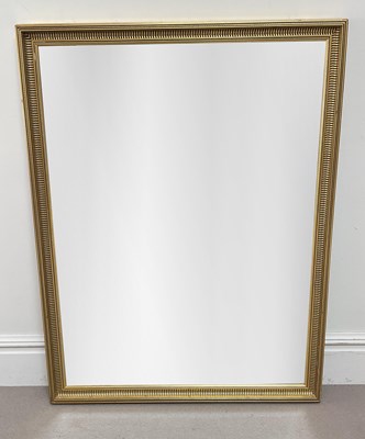 Lot 2088 - A large modern gilt framed wall mirror with...