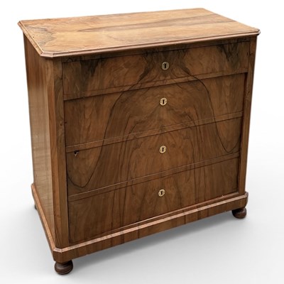 Lot 108 - An early 20th century walnut cabinet modelled...