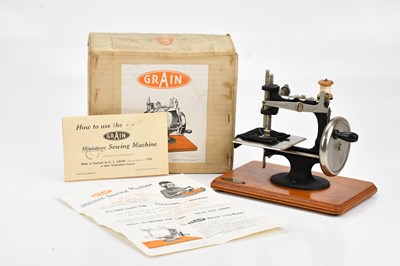 Lot 501 - GRAIN; a miniature child's sewing machine,...