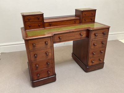Lot 138 - A Victorian mahogany inverted breakfront desk,...