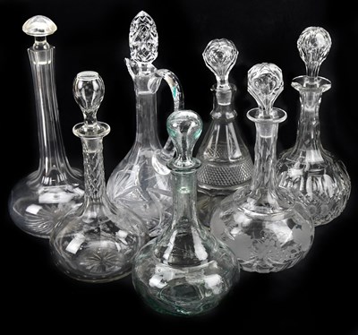 Lot 1473 - Seven cut glass decanters, largest 34cm.