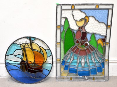 Lot 351 - A stained glass panel depicting a stylised...