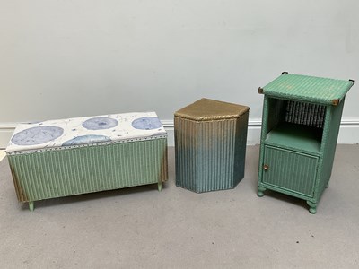 Lot 109 - LLOYD LOOM; a bedside cabinet, blanket box,...