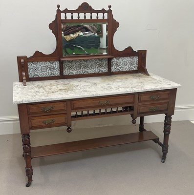 Lot 1192 - An Edwardian walnut washstand with bevelled...