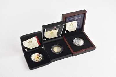 Lot 617 - Three British proof coins comprising an...