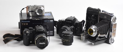 Lot 641 - CANON; an EOS 100 camera, a Fujifilm Finepix,...