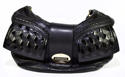 Lot 661 - VERSACE; a large black soft leather handbag...