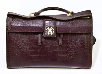 Lot 662 - ROBERTO CAVALLI; a large brown crocodile...